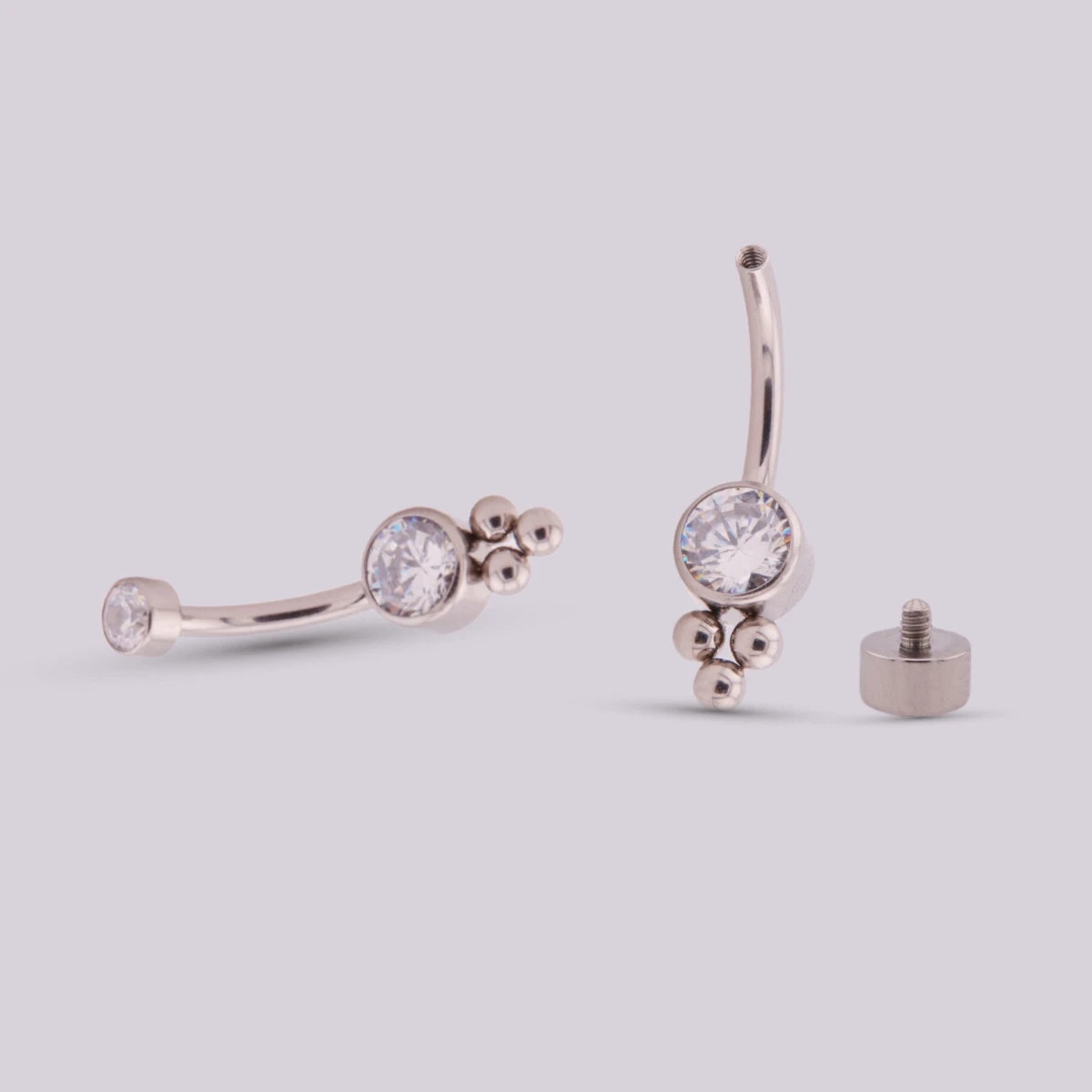 Piercing Ombligo Trinity en Titanio – Plateado